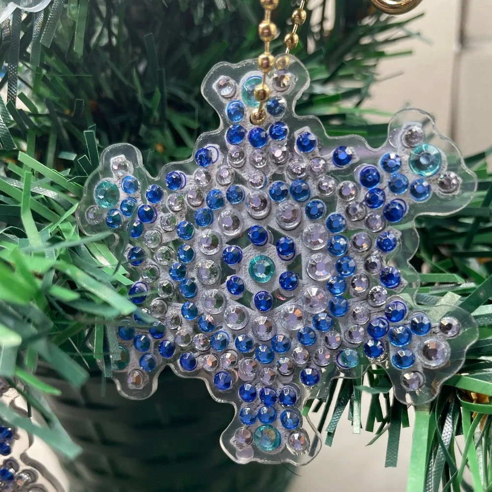 4 Christmas rhinestone snowflake ornaments. Handmade. Decorated on both sides.